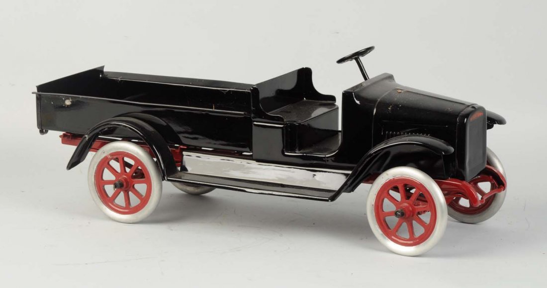 Pressed Steel Buddy L Spoke Wheel Express.: 24 inches long. First toy of Buddy L production. 1921-1925. Professional restoration to an all original truck. Condition (Restored). Size 23'' L.