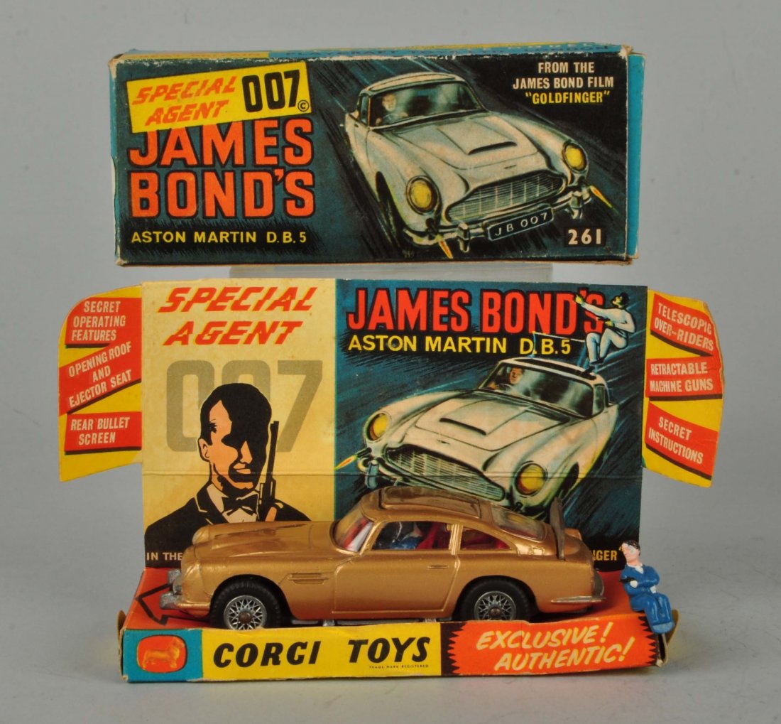 Corgi #261 James Bond's Aston Martin D.B. 5.: Car is mint and complete in original box. Original box includes insert. Insert and box shows some wear and creasing. Size 5" L.