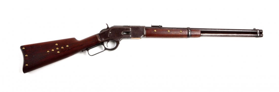 Winchester Model 1873 SRC (A).: Serial # 123066 Barrel length 20", .44-40 caliber. Standard carbine manufactured in 1883 in the popular .44 caliber. Features: 20" full round barrel, full magazine, two barrel bands, post front sight,