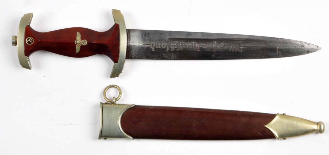 Nazi S.A. Dagger.: 8-1/2" Blade with ALLES/FUR/DEUTHCHLAND. Made by Otto Simon Steinbach, Kem. Blade has substantial pitting, no washer. Perfect grip and insignia. Perfect scabbard and mounts. No hangers. Condition (Goo