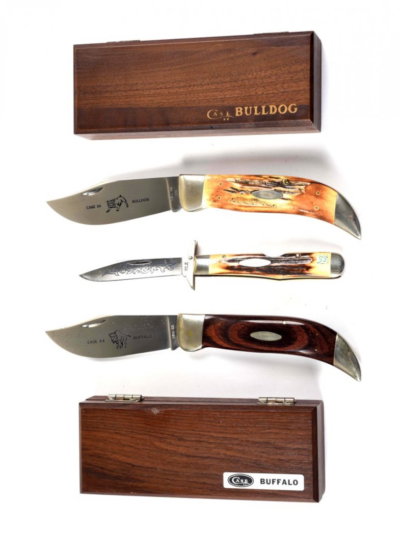 Lot of 3: Large Case Folding Knives.: Case XX 5172 5-1/2" No. 5172 boxed "Bulldog" handled in genuine stag. Case XX P172 5-1/2" No. P172 one-blade boxed "Buffalo" handled in pakkawood. Case XX Stainless U.S.A. 4-3/8" No. 5111-1/2 one-blad