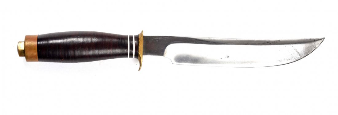Custom Fixed Blade Knife for Abercrombie & Fitch.: Made in Mexico for Abercrombie & Fitch. Although not marked Randall, this knife is an exact image of a war-time Randall. Saber ground clip point blade measures 7-3/4", overall is 13". Handle is stacke