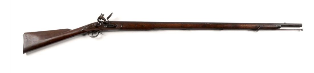English Colonial Flintlock Musket (A).: Serial # 22? Barrel length 39-1/2". 16 bore. Offered is a fine English made single shot flintlock fowling piece. Barrel has English proofs, stamped 22. Retains 90% of its original brown finish. Lock p