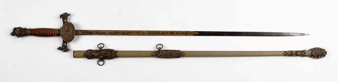 FOB Sword.: 30" Diamond blade. Made by George Lauteren, Chicago. Nice etching on blade. Good washer. Leather grips. Has minor scuffing. Perfect twisted wire. Knights head pommel with V.R. and cross guard marked w