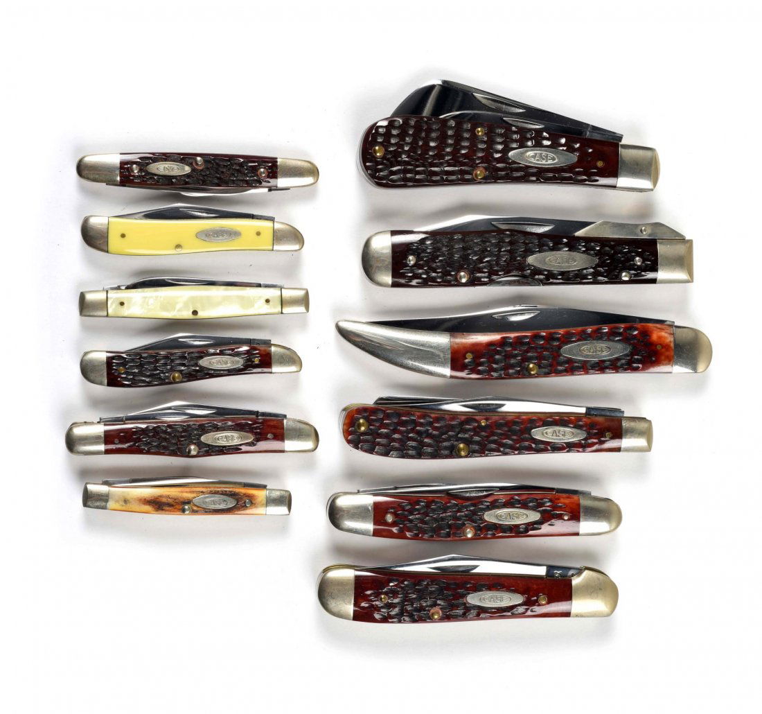 Lot of 12: Case Folding Knives.: Case XX U.S.A. 5" No. 61093 one-blade "Texas Toothpick" handled in bone; circa 1964 to 1970. Case XX U.S.A. 5-3/8" No. 6111-1/2 L one-blade folder with a lock back features and swing guard; circa 1971