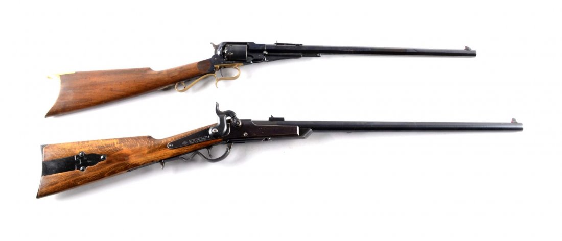 Lot of 2: Replica Black Powder Carbines (A).: Serial # 1507 & 000880 A) Navy Arms Model 1858 Remington, six shot, .44 caliber, percussion carbine. Barrel 20" octagon, blued finish, walnut stock with brass butt plate and trigger guard. Gun has bee