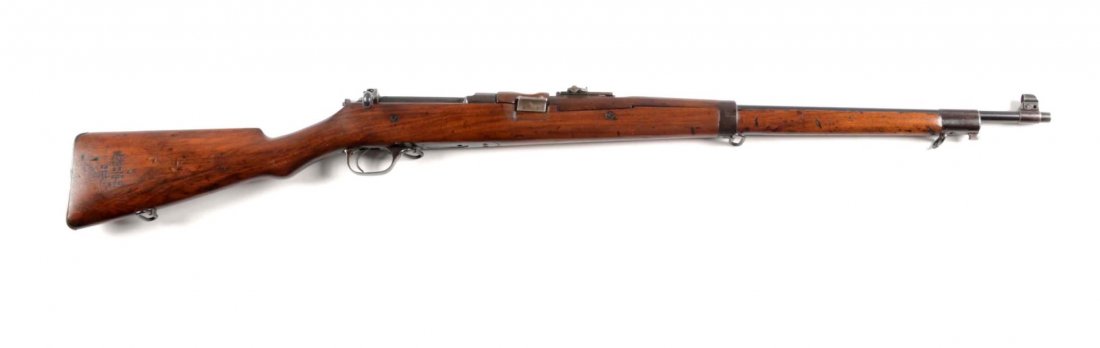 (C) Ross Model 1905 Bolt Action Rifle.: Serial # 18358 .303 British, Barrel length 28". Manufactured in Quebec. This rifle was widely used by the Canadian forces during the first World War. Referred to the Model 1905 Mark II. Has the proper