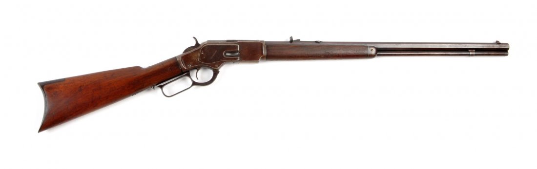 Winchester Model 1873 Lever Action Rifle (C).: Serial # 587472B .32-20 caliber, Barrel length 24". Manufactured in 1904. Standard rifle in all respects with full octagon barrel, full magazine, sporting sights, walnut stocks, rifle butt, blue finis