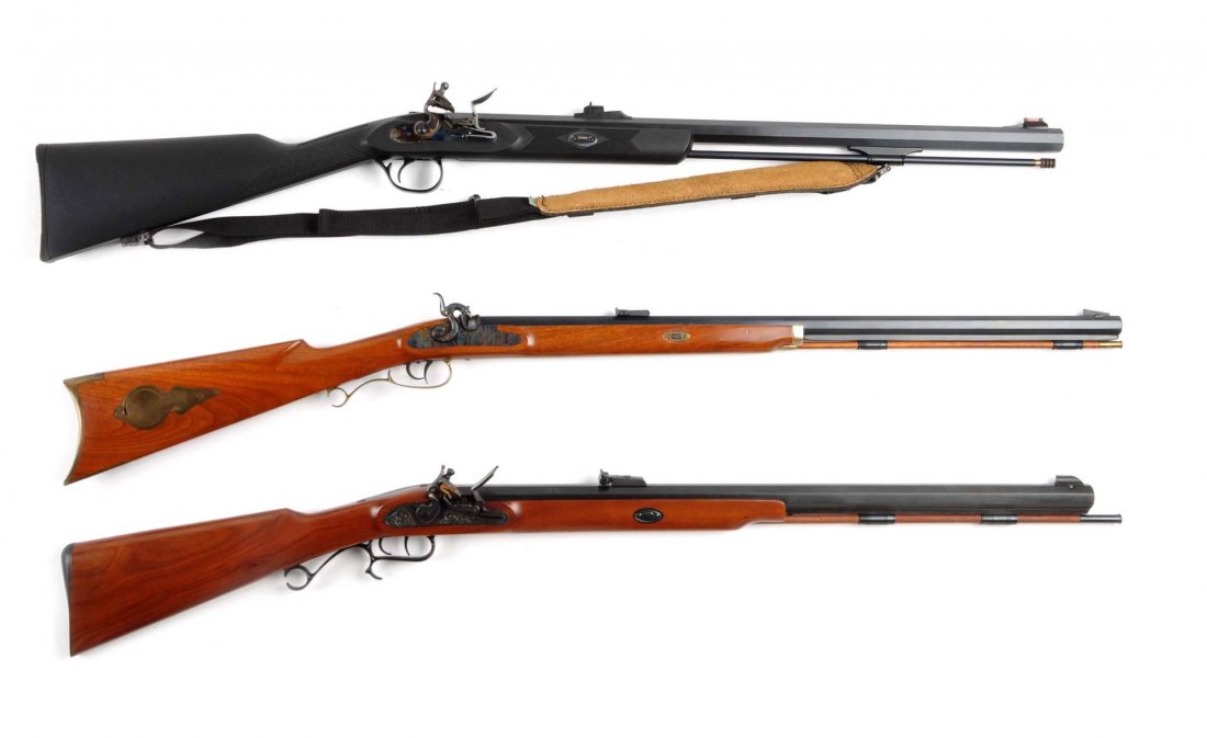 Lot of 3: Muzzle Loading Rifles (A).: Offered is a trio of muzzle loading, half stock, sporting rifles. Rifle A: Thompson Center Arms, 50 Cal. percussion flint lock rifle with a 26-1/2" full octagon barrel, blued finish, walnut stock, dou