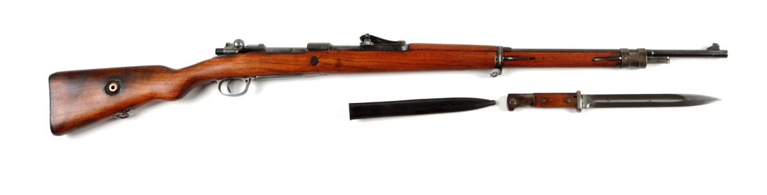 German Model GEW 98 Mauser Bolt Action Rifle (C).: Serial # 5750 7.92x57mm, barrel length 29.13". The GEW 98 was the standard infantry rifle used by Germany during the First World War. Its most distinctive feature is the so called Roller Coaster rear