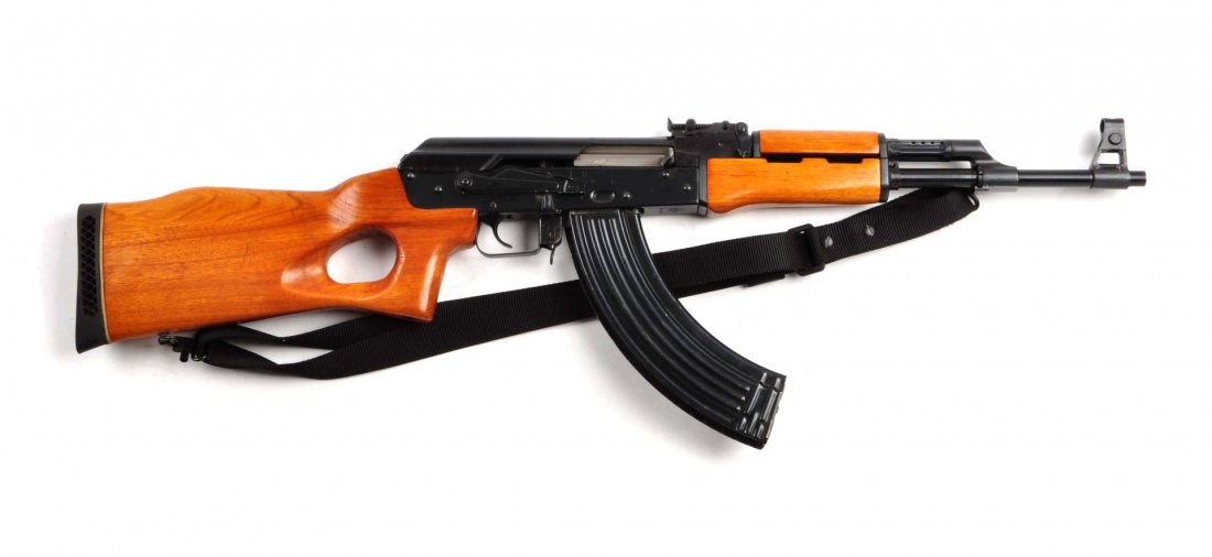 Chinese AK47 Type Semi-Automatic Carbine (M).: Serial # 34167 This is a MAK-90 Sporter, caliber is 7.6X39, standard carbine military finish, hardwood stocks, with thumb-hole grip, with rubber recoil pad, this