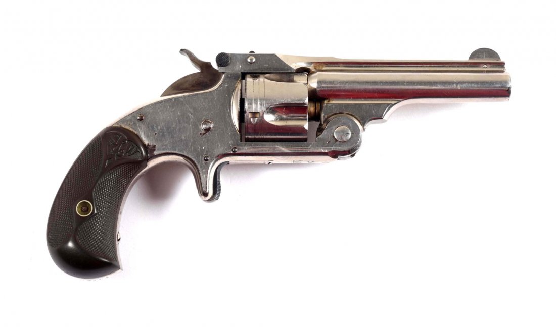 S&W .32 Single Action Revolver (A).: Serial # 23125 Barrel length is 3", caliber is .32 S&W. Manufactured from 1878 to 1882. Referred to as the model 1-1/2 center fire. It is a five shot, single action, spur trigger, nickel finish with S