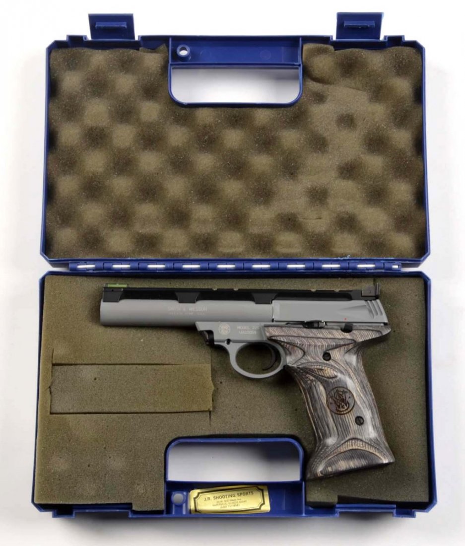 Cased S&W 22-S Semi-Automatic Target Pistol (M).: Serial # UAU3059 5-1/2" barrel in .22 rimfire caliber. The 22-A series was introduced in 1996. This model was introduced in 2001 and features the 5-1/2" bull barrel with hi-viz green dot front sight. 