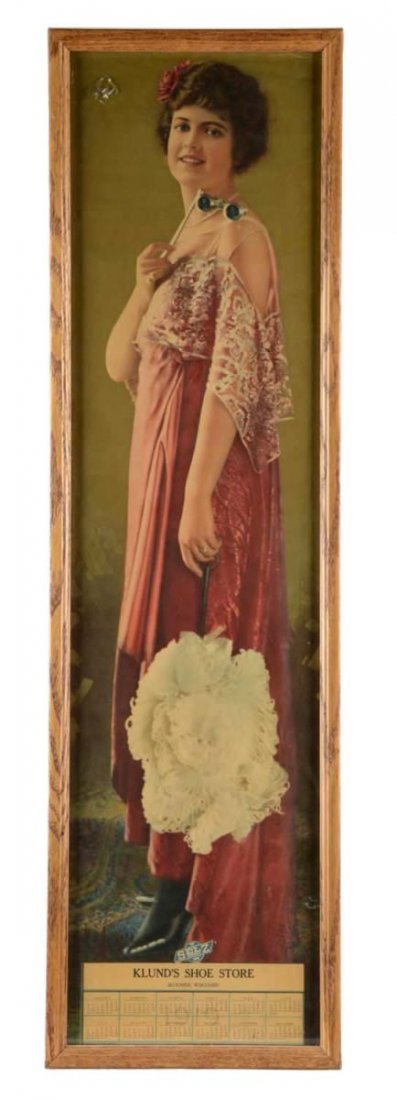 1919 Blund's Shoe Store Calendar: Framed under glass is 1919 color lithographed print of a woman in elegant attire holding opera glasses. The calendar is for Blund's Shoe Store in Wisconsin. Condition (Excellent). Size 11" x 38-1/2"