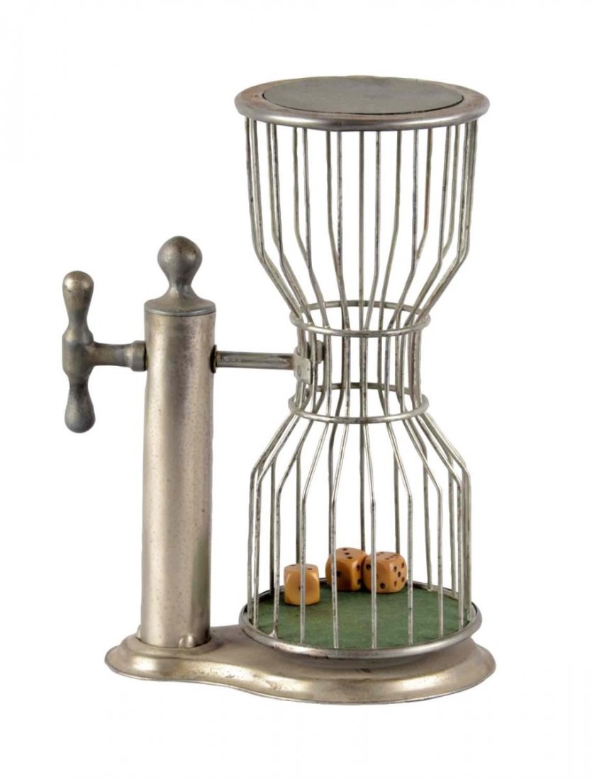 Early Countertop Chuck A Luck Dice Cage: This countertop birdcage is lined with green felt and includes three Catalin dice. Metal stand, turning handle, and base show minor pitting. Condition (Very Good). Size 11-1/2" x 8-1/2" x 5-3/4"