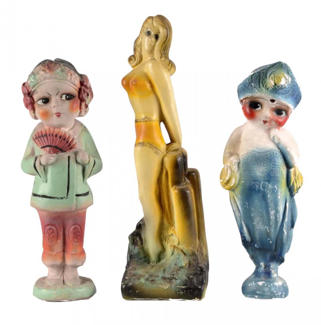 Lot Of 3: Vintage Carnival Chalkware: This is a lot of three chalkware statues of three classic beauties. Includes 1 - Miss America posing on the pier, and 2 - kewpie dolls dressed in exotic costumes. All three of these statues have imper