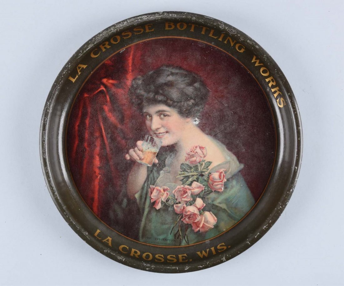 La Crosse Bottling Works Advertising Tray.: Moderate paint nicks to the edges. Main field has some fading and cloudiness. Condition (Good). Size 13" Dia.