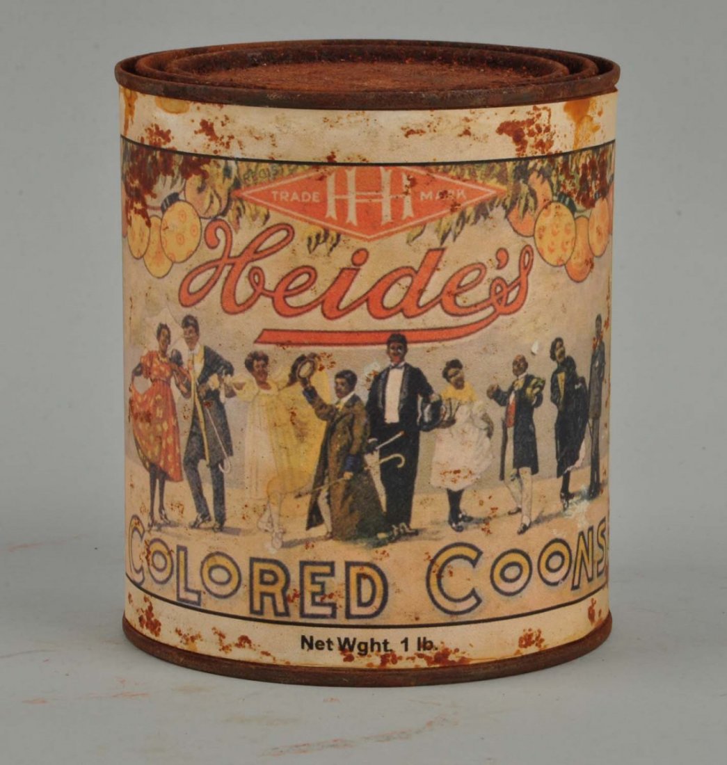 Heide's Colored Coons Tin with Paper Label.: Heavy soiling to the label. Label appears to be a reprint. Condition (Fair). Size 5" T.