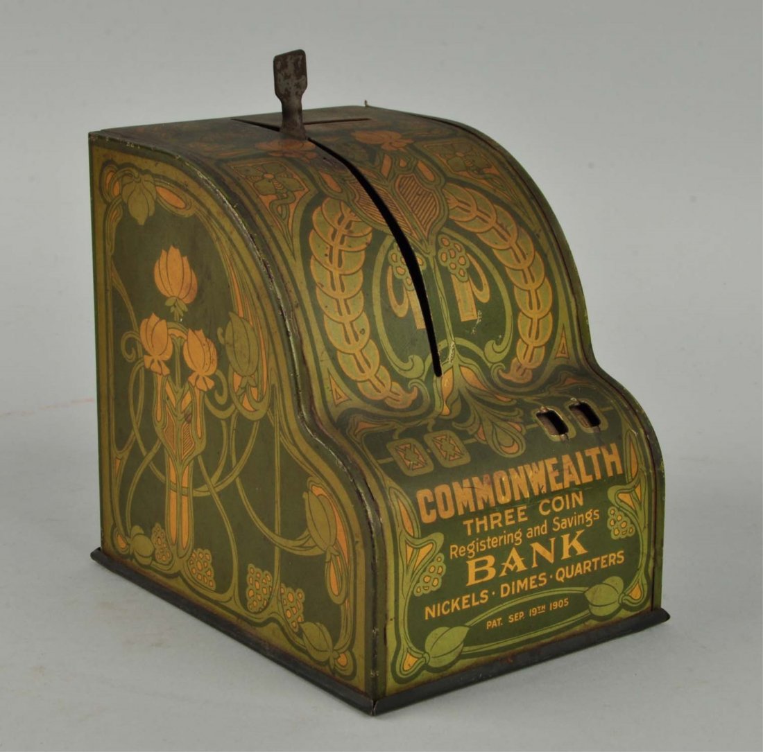 Commonwealth Three Coin Tin Bank. (1 of 2)