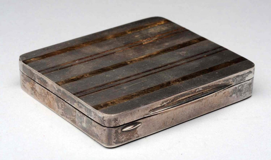 Dunhill Sterling Silver & 18K Gold Box.: Likely for cigarettes. Minor dents in one corner. Size 3-1/2'' x 2-3/4''.