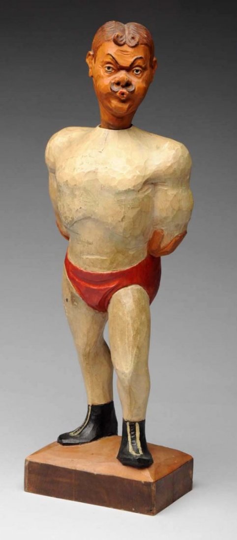 Carved Wood Whistler Wrestler.: Bellows and whistles. Works sporadically. Marked Germany on the bottom. No damage or repairs. Size 14" T.