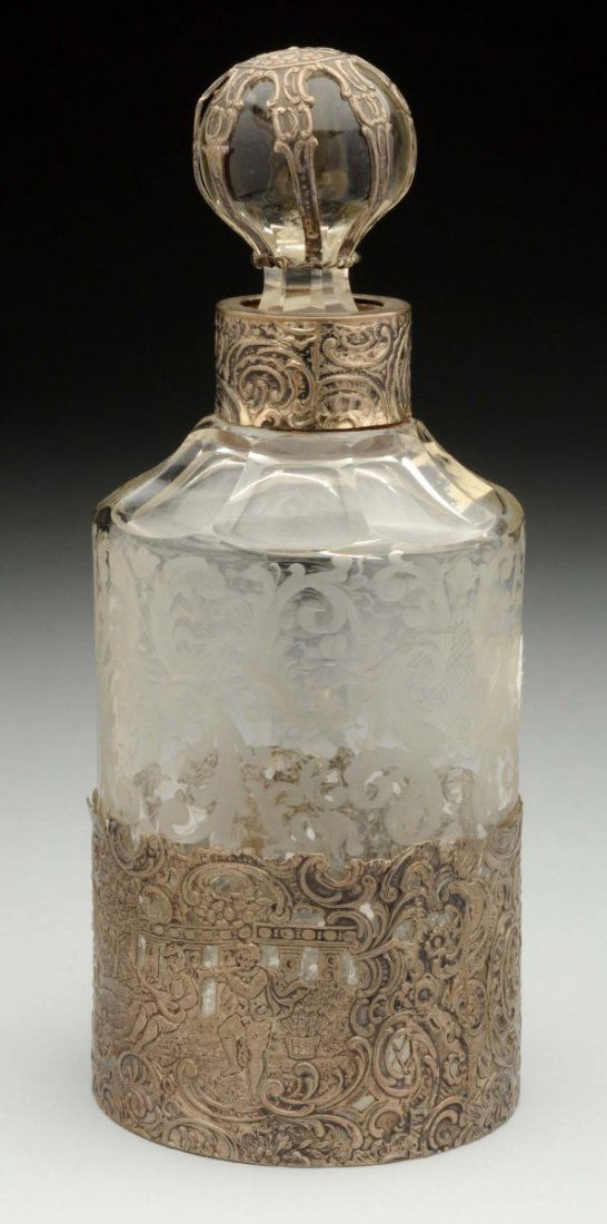 A Silver Mounted Perfume Bottle. (1 of 3)