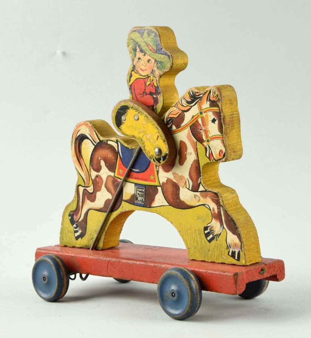 Fisher Price Paper on Wood No 430 Buddy Bronco Toy: Hard to find toy. Complete but with some paper loss to bottom of chap. Condition (Very Good). Size 8 - 1/2" L.