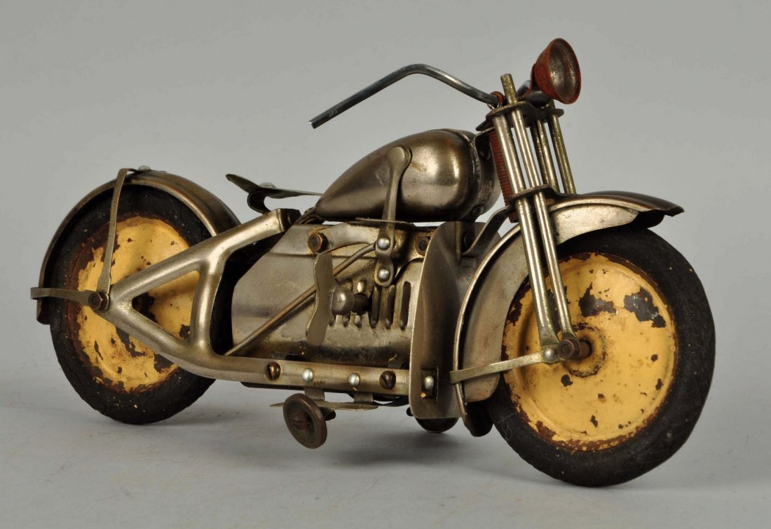 Foreign Made Tin Wind-up Motorcycle Toy. (1 of 4)