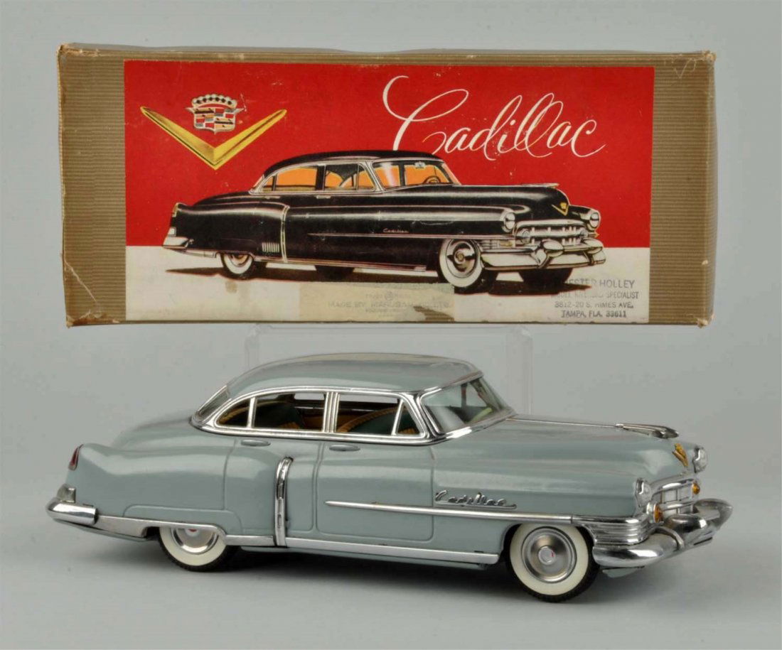 Japanese Tin Litho Friction Marusan Cadillac. (1 of 2)