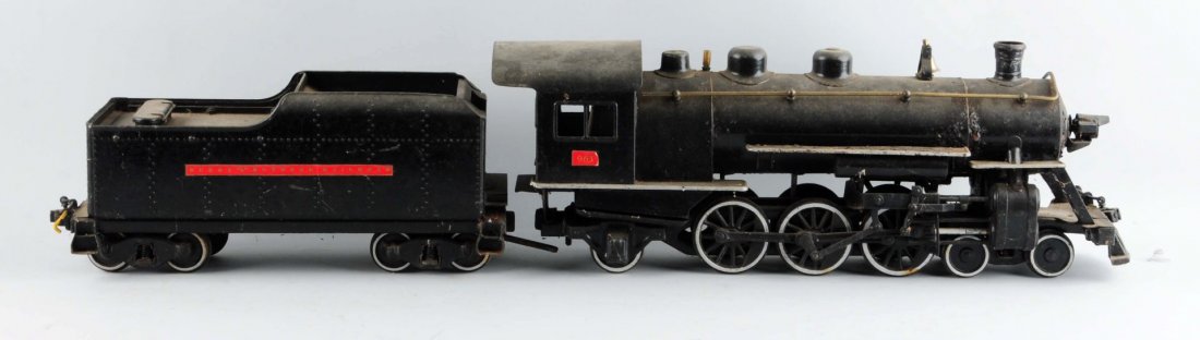 Pressed Steel Buddy L. Locomotive & Tender.: Complete and all original. There are some scratches and paint chips throughout. Cab lettering has been replaced. Tender has also been re-lettered. Both pieces need to be cleaned. Condition (Very Good)