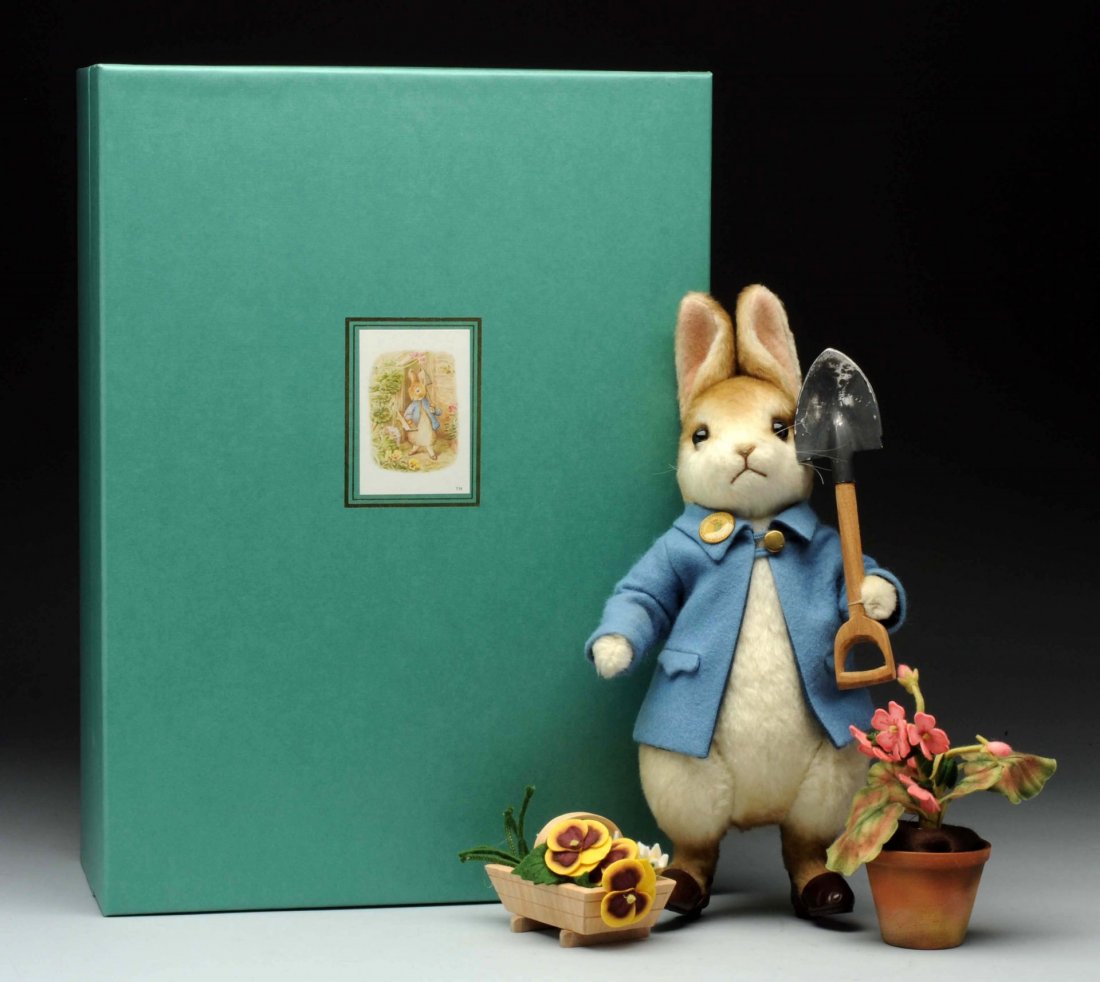 R. John Wright Peter Rabbit Centennial.: This very appealing edition was produced in 2002 to commemorate the Peter Rabbit centennial celebration and is part of the R. John Wright Beatrix Potter Collection. Peter stands 12" tall, is fully joi