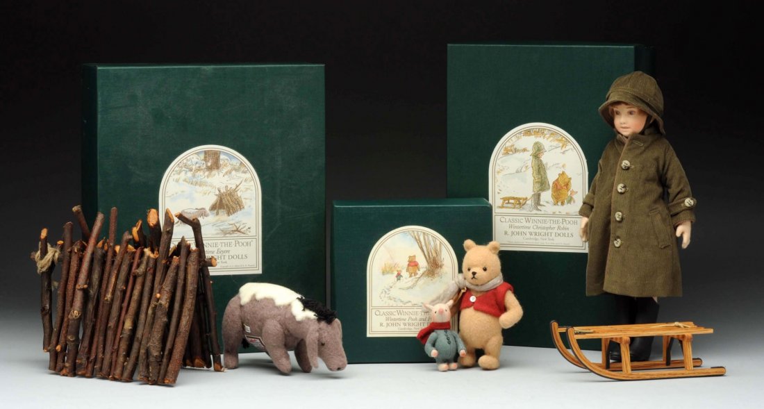 Three Winnie the Pooh Editions by R. John Wright.: This lot includes three cold-weather themed A. A. Milne characters produced for the high-end toy retailer FAO Schwarz. The first is Wintertime Eeyore. Eeyore stands 3-1/2" tall and is made from mohair