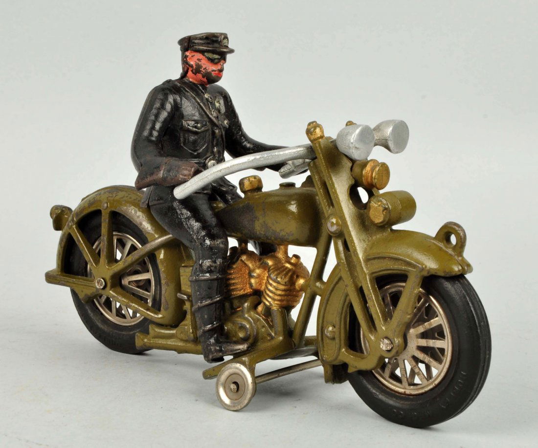 Green Cast Iron Motorcycle with Driver. (1 of 3)