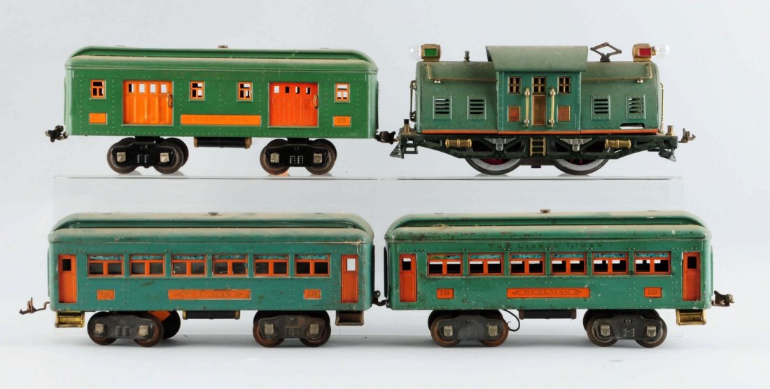 Lot Of 4: Lionel No.10E Locomotive & Cars.: No. 10E Locomotive, complete, paint chips, needs cleaning. No. 339 Pullman, corrosion on wheels and axles, needs couplers, paint chips, needs cleaning. No. 339 Pullman, corrosion on wheels and axles, 