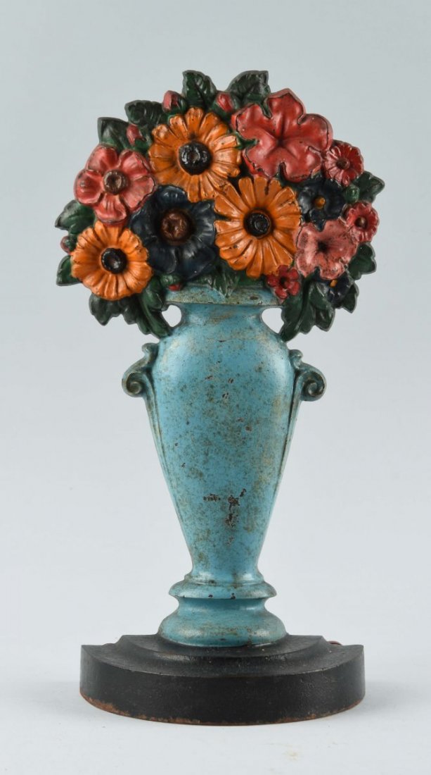 Cast Iron Mixed Flowers in Urn Doorstop. (1 of 1)