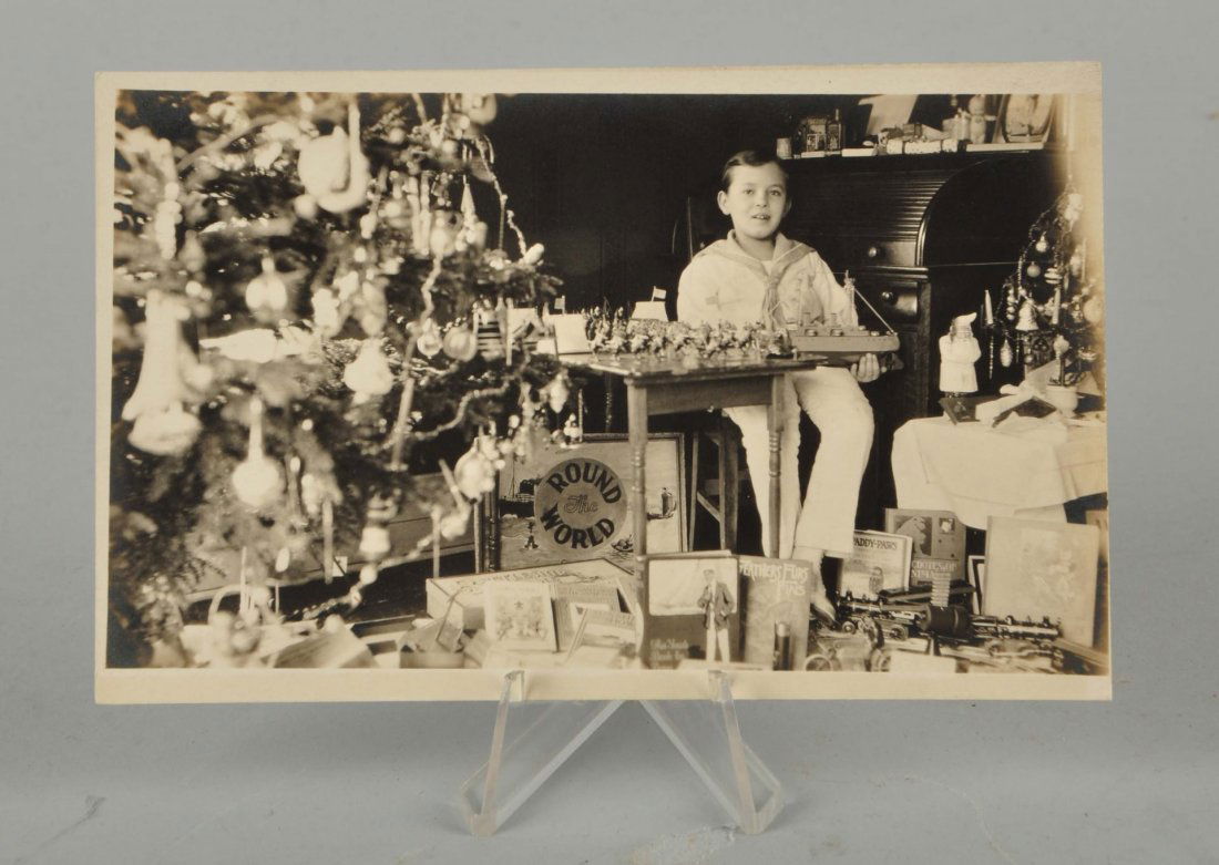 Real Photo Post Card of Boy and Christmas Gifts. (1 of 2)