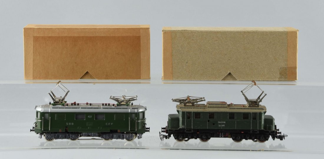 Lot Of 2: Marklin Locomotives In Boxes.: No. 3014 Electric Outline Locomotive and No. SE800 Electric Outline Locomotive, complete and all original, clean and attractive and in excellent condition. Condition (Excellent).