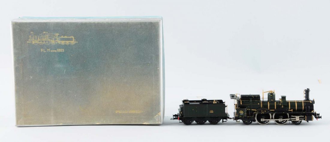 Fulgurex 2-4-2 Steam Locomotive & Tender.: Locomotive and tender are in excellent condition. Original box shows wear and the styrofoam inside has started to disintegrate. We do not believe that any damage was done to the trains. Condition (Exc