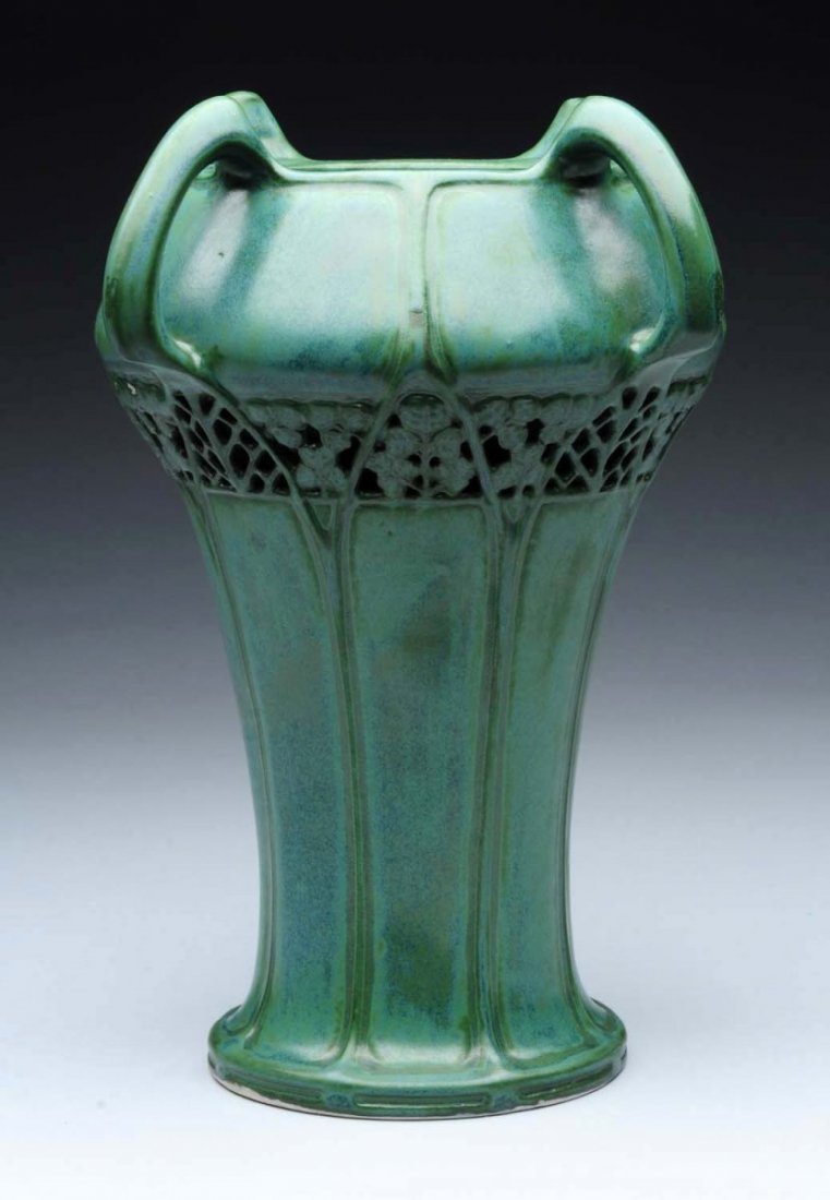 Eduard Stellamcher Co. Ceramic Clover Vase.: Four Handled Reticulated. 10. 5 inches high, 1906. Eduard Stellmacher raised Monogram Mark, impressed 2021, Mint. Illustrated in Monsters and Maidens Collectors Edition, Byron Vreeland, page 382. A si