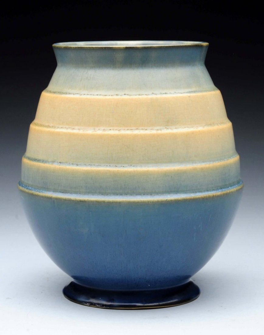 Roseville Futura " Step Egg Vase".: Shape: #424-7", small touch up to base. 7" tall x 5-1/2" wide. Condition (Good). Size 7" T.