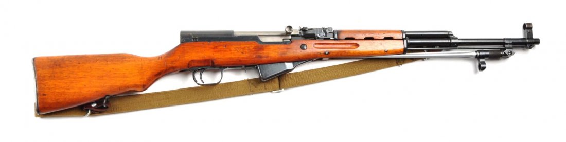 (M) Chinese SKS Semi-Automatic Rifle.: Serial # 11324620 7.62x39mm caliber with a 20" barrel. Offered is a nice early Chinese manufactured non-import SKS. Matching numbers on stock, trigger guard, magazine, and bolt. Has the standard two p