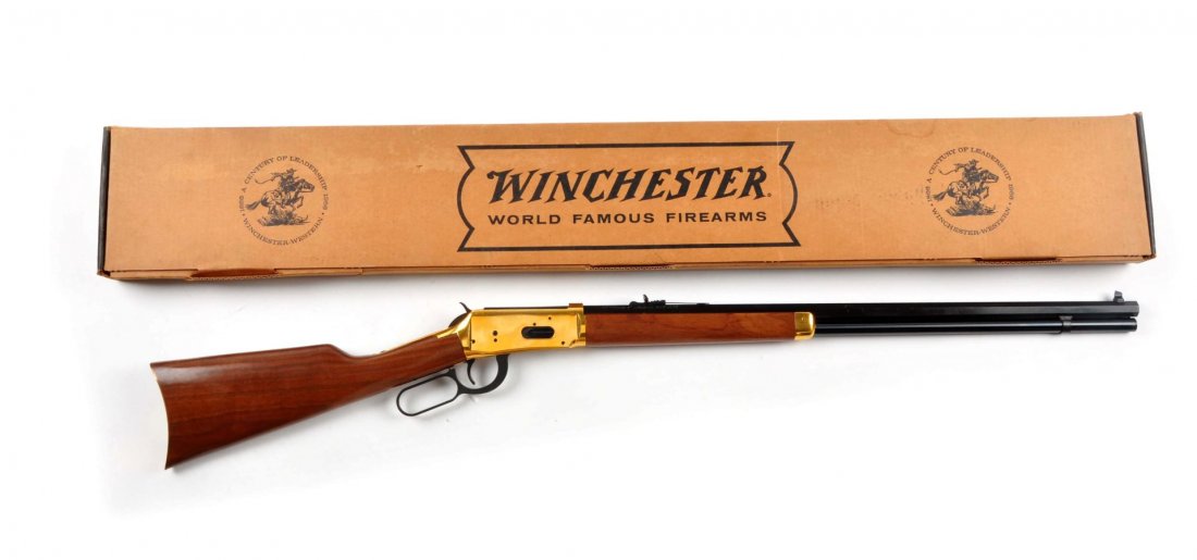 (C) MIB Winchester Model 94 Centennial Rifle.: Serial # 7656 26” barrel in caliber .30 WCF. This was the first commemorative rifle manufactured by Winchester in 1966 (they did do a special carbine in 1964 for Wyoming). 1966 was the 100th anniver