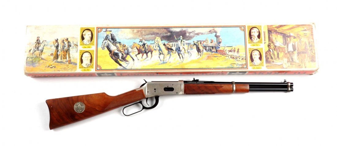 (M) MIB Winchester Mod 94 Carbine Legendary Lawman: Serial # LL19596 16” barrel in .30 WCF. Winchester produced this carbine in 1977. Often referred to as a Trapper’s model. Features a blued full round barrel with full magazine, carbine butt plate,