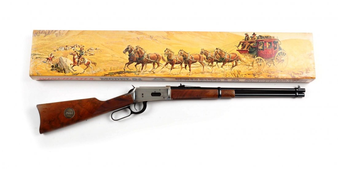 (M) MIB Winchester Model 94 Carbine Wells Fargo.: Serial # WFC17947 20" barrel in caliber .30 WCF. Winchester produced this special carbine in 1977 to commemorate 125 years of the Wells Fargo Company. Features full magazine, sporting rear sight, dove