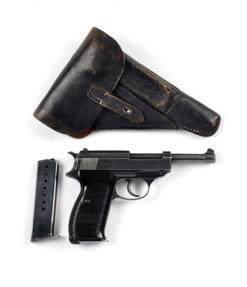 (C) Walther P.38 Nazi Marked Semi-Auto Pistol: Serial # 828 4.93” barrel in caliber 9mm. Pistol stamped with the cyq factory code. Mid-war with all matching numbers. Features blued finish, standard silver-grey front grip strap, excellent two pie
