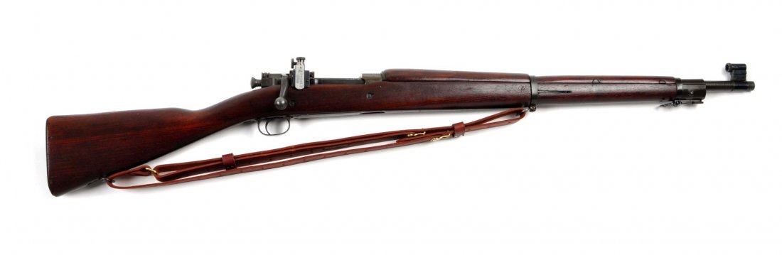 (C) U.S. Remington 1903-A3 Rifle.: Serial # 3369780 24" barrel in caliber .30-06. Barrel is dated 1-43 and stamped "RA" with bomb. This is a typical World War II Model 1903-A3. It has the green tint parkerized military finish. 85-90% r