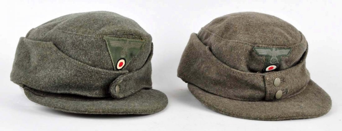 Lot of 2: Nazi German Army M43 Caps.: Both are made of heavy grey wool and have the cloth eagle and swastika patches. Intact headbands. Liners are stamped. Condition (Excellent).