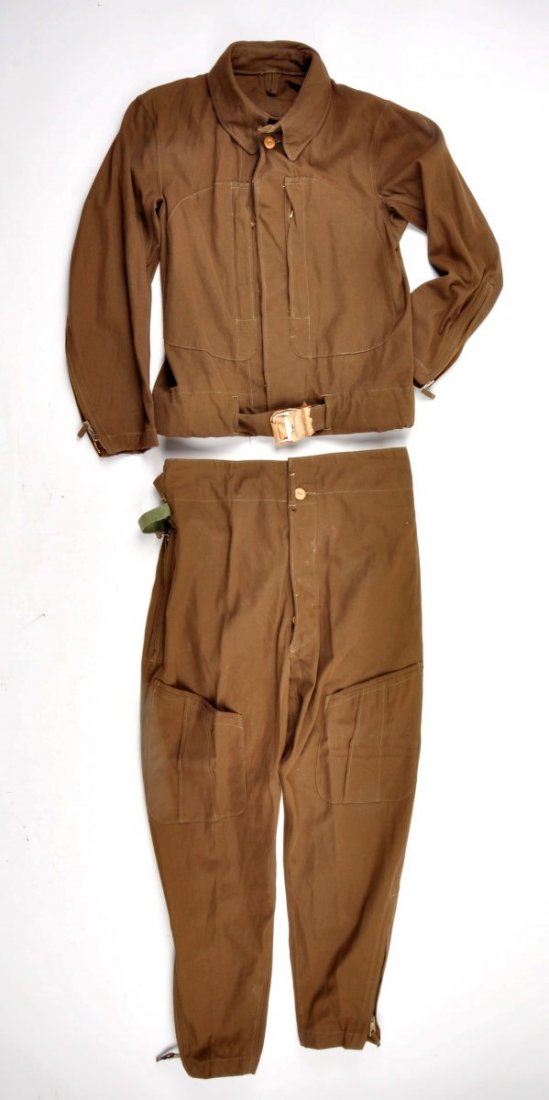 Lot of 2: Japanese Flight Suits.: Both of these Japanese flight suits remain in excellent to near mint condition. Both have trousers. Jackets have waist belts. All original buttons intact. No holes. One of the belts is still wrapped i