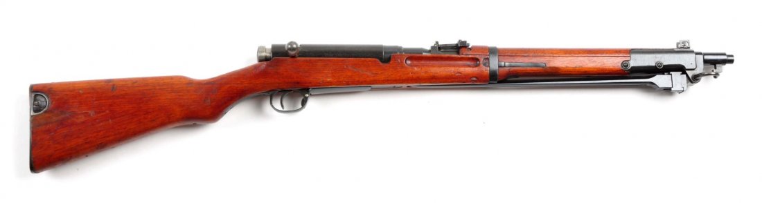 (C) Japanese Type 44 Carbine.: Serial # 7206 19" barrel in caliber 6.5mm Japanese. Manufactured at the Chigusa factory, Nagoya Arsenal. Long type third variation bayonet housing, inverted V front sight with guards, open V rear sigh
