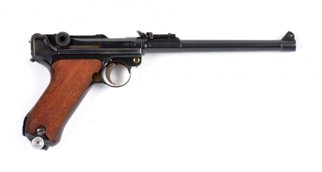 (C) DWM 1914/1917 German Artillery Luger Pistol: Serial # 9470 Caliber 9mm, Barrel length 8". Standard artillery Luger manufactured in 1917 by DWM for the German army. Has the 9 position rear adjustable sight. All matching numbers. Checkered walnut 